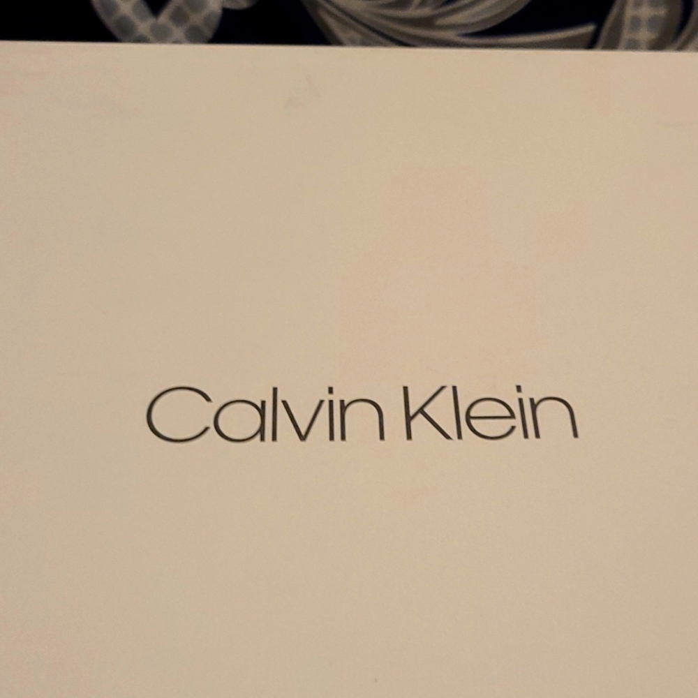 Calvin Klein black leather New in box.
